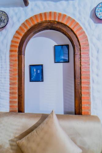 Letto o letti in una camera di Splendid traditioanal house in the main square