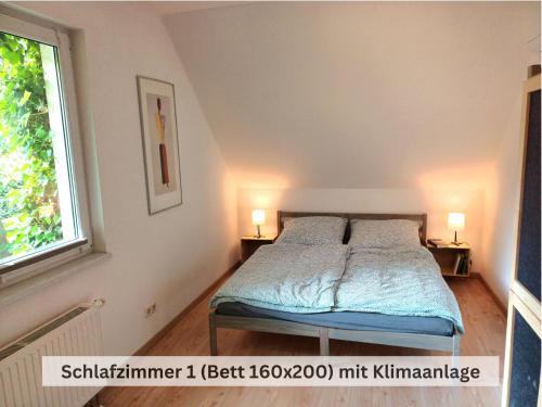 Ein Bett oder Betten in einem Zimmer der Unterkunft Ivy Haus