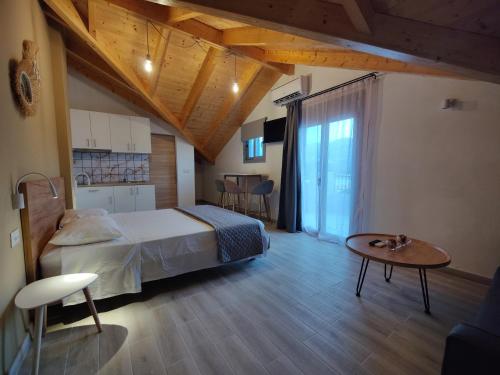 Postel nebo postele na pokoji v ubytování Jajamini loft