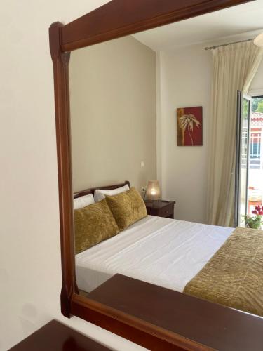 Ένα ή περισσότερα κρεβάτια σε δωμάτιο στο Sole e Mare Suite at Sidari Beach