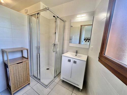 a bathroom with a shower and a sink at Résidence Les Terrasses De Vars Ste Marie - LES TERRASSES DE VARS SAINTE MARIE MAE-3701 in Vars