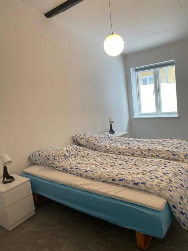 Cama o camas de una habitación en Charming - Luxurious 1 bedroom apartment in The Heart of Aalborg