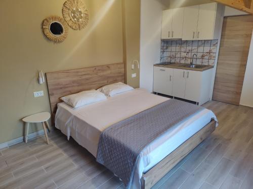 Postel nebo postele na pokoji v ubytování Jajamini loft