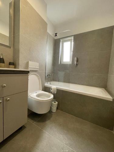 Ванная комната в Andreeas Apartaments