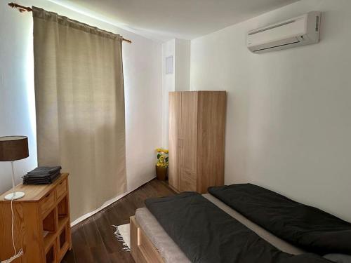 Katil atau katil-katil dalam bilik di Maya Apartman