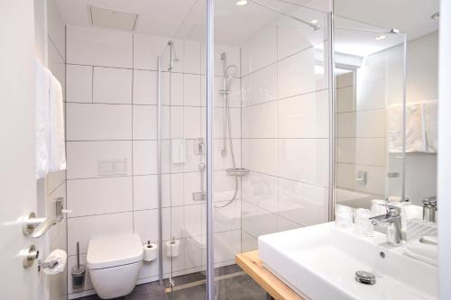 Tulip Inn Ludwigshafen Cityにあるバスルーム