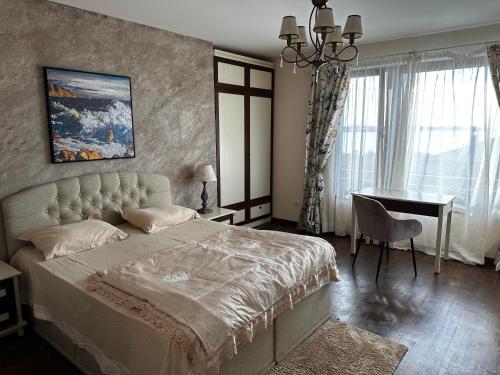 A bed or beds in a room at Sozopolis Cliffs Luxury Seaview Villa