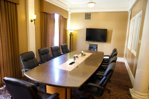 a conference room with a large table and chairs at Spokane Club Hotel in Spokane