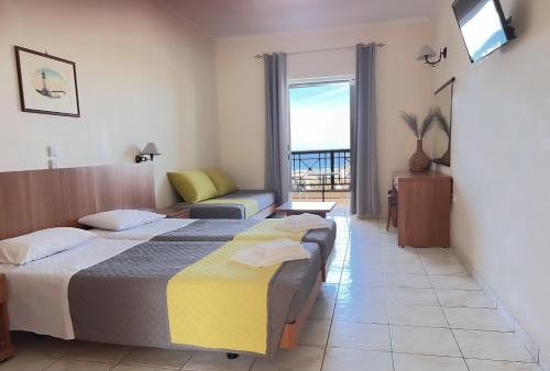 Cama o camas de una habitación en Ariadne Apartments