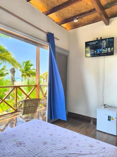 Hospedaje "Las Brisas de Zorritos"にあるベッド
