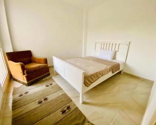 Ένα ή περισσότερα κρεβάτια σε δωμάτιο στο Hotel Home in Madinaty