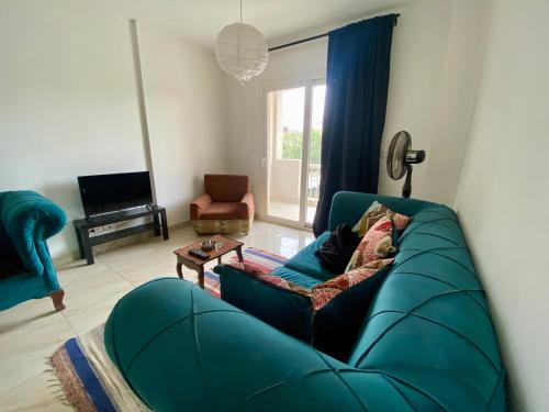 Χώρος καθιστικού στο Hotel Home in Madinaty