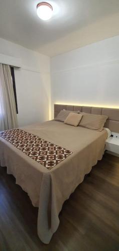 Un ou plusieurs lits dans un hébergement de l'établissement Flat Alameda Lorena - Prédio Ninety - Jardim Paulista