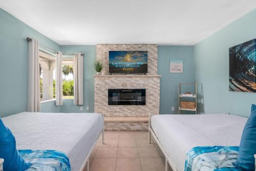 Katil atau katil-katil dalam bilik di Latitude 26 Waterfront Boutique Resort - Fort Myers Beach