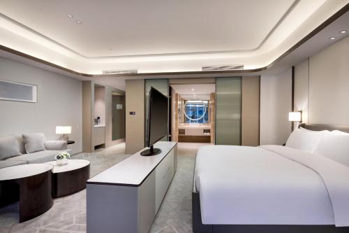 Katil atau katil-katil dalam bilik di Holiday Inn Ningde Dijing by IHG