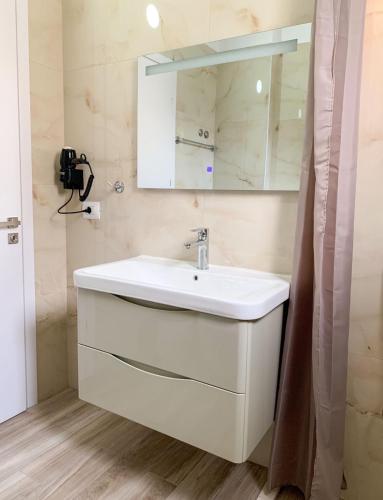 Koupelna v ubytování ODORE DI MARE APARTMENTs