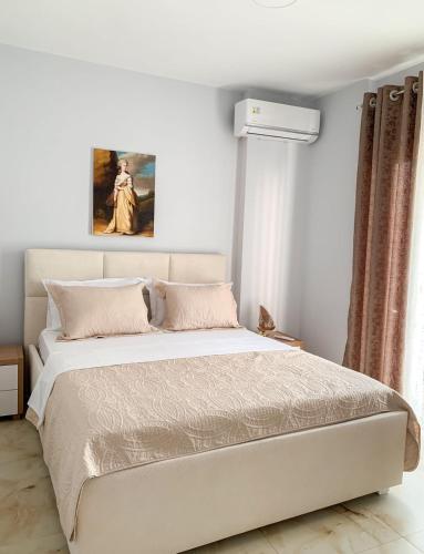 Postel nebo postele na pokoji v ubytování ODORE DI MARE APARTMENTs