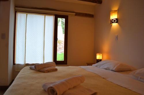 Cama ou camas em um quarto em Al Sereno Hotel y Spa
