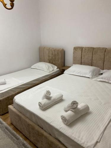 Ένα ή περισσότερα κρεβάτια σε δωμάτιο στο DD Apartment