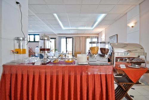 a table with some food on top of it at Hotel Coronis in Naxos Chora