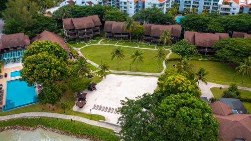 an aerial view of a resort with a swimming pool at Ombak Villa Langkawi in Pantai Cenang