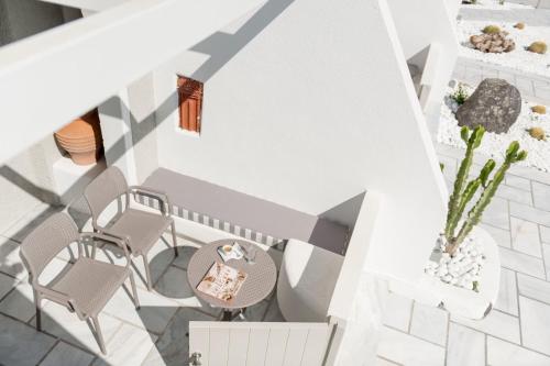 an overhead view of a room with chairs and tables at Caldera's Dolphin Suites in Megalokhori