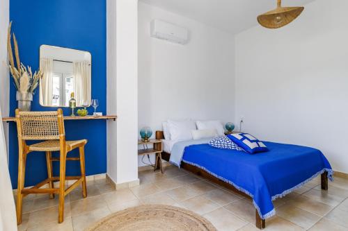 Katil atau katil-katil dalam bilik di Theros Holiday Home