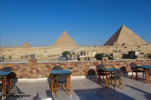 a view of the pyramids from the roof of a restaurant at Pyramids Island in Cairo