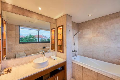 Ένα μπάνιο στο Ocean Sunny Villas Da Nang