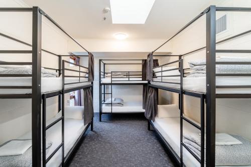 a group of bunk beds in a dorm room at YHA Thredbo in Thredbo