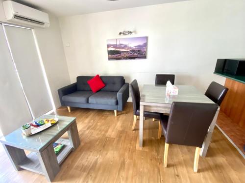 Zona de estar de Reef Gateway Apartments