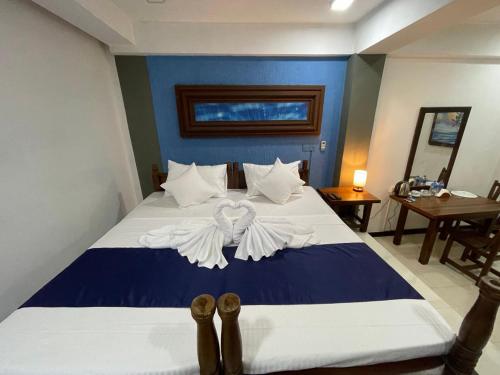 Postel nebo postele na pokoji v ubytování Rush City Hotel Kandy