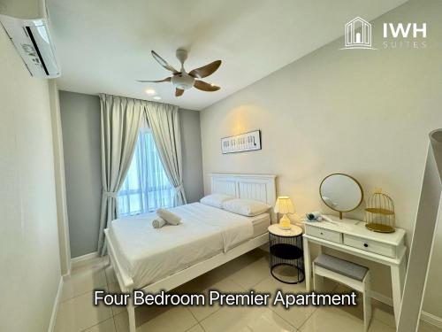 a bedroom with a bed with a dresser and a window at Ipoh Waterpark Manhattan Premium Suites by IWH Suites in Ipoh