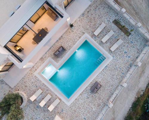 an overhead view of a swimming pool in a house at Villa Ida in Kamilari