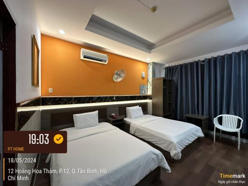 Postel nebo postele na pokoji v ubytování Phúc Khang Hotel Airport