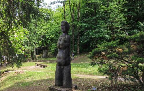 a statue of a woman in a park at Kuca Za Odmor Agata in Banščica