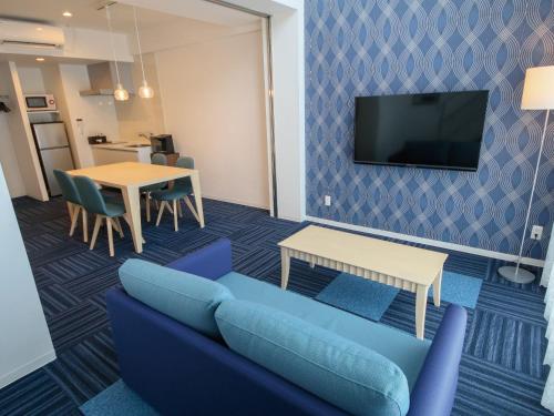 TV a/nebo společenská místnost v ubytování Hotel Chula Vista SENAGA -SEVEN Hotels and Resorts-