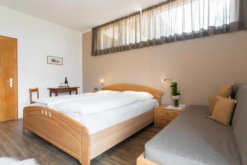 Postel nebo postele na pokoji v ubytování Sonnenhof- Urlaub auf den Bauernhof
