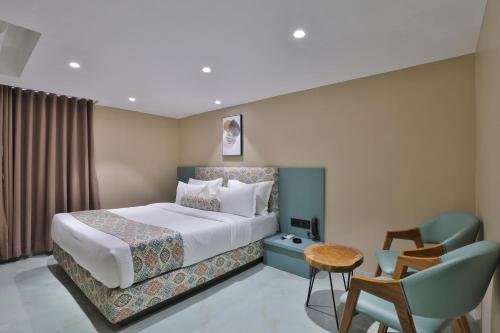 Postel nebo postele na pokoji v ubytování Hotel Serenity