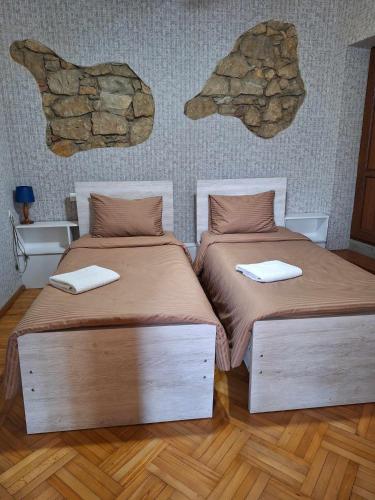 Postel nebo postele na pokoji v ubytování Guesthouse Litoros