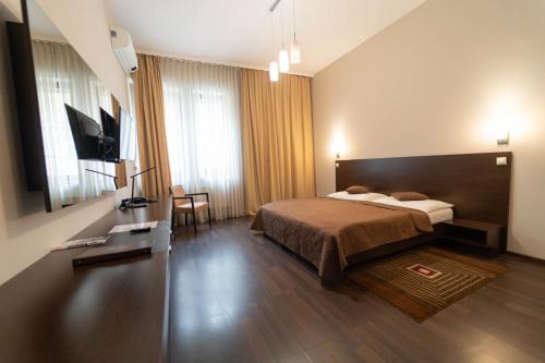 Boutique hotel Zlaty Dukatにあるベッド
