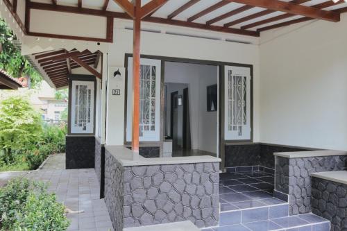 Patio nebo venkovní prostory v ubytování Villa Malioboro Yuwono Heritage By Sajiwa