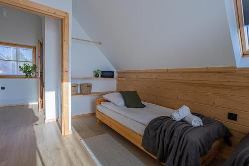 a bedroom with a bed in a room at Osada Przystanek Czorsztyn in Czorsztyn