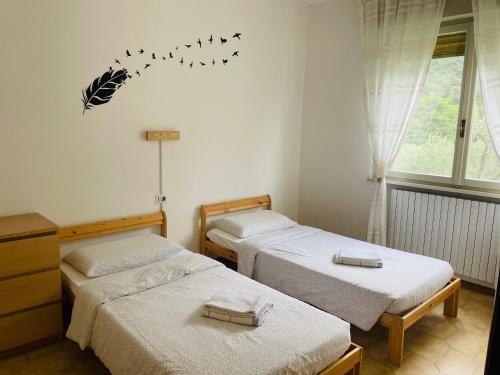 Ένα ή περισσότερα κρεβάτια σε δωμάτιο στο Casa Viktoria