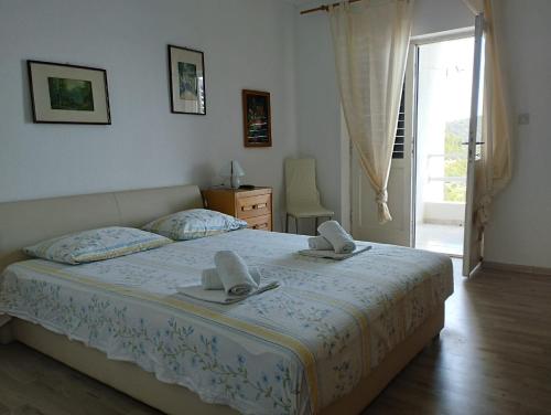 Postel nebo postele na pokoji v ubytování Borovik Guest House
