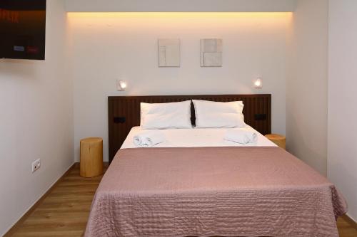 Ένα ή περισσότερα κρεβάτια σε δωμάτιο στο LOCAL SUITES - Nea Moudania Chalkidiki