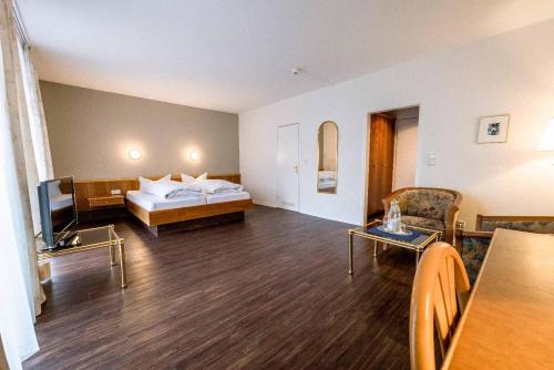 Letto o letti in una camera di Kurhotel San Andreas