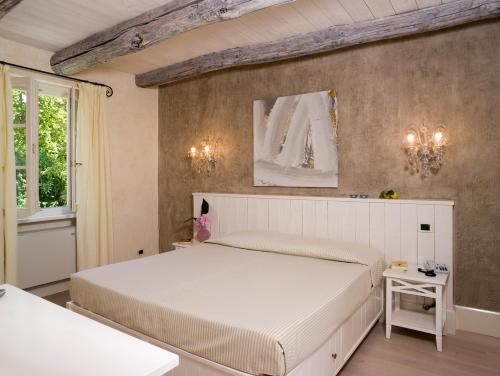 Postel nebo postele na pokoji v ubytování Park Hotel Villa Belvedere
