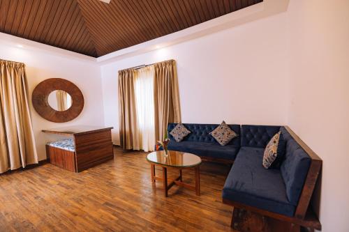 Posezení v ubytování Elixir Woods Luxury Resort And Spa, Munnar