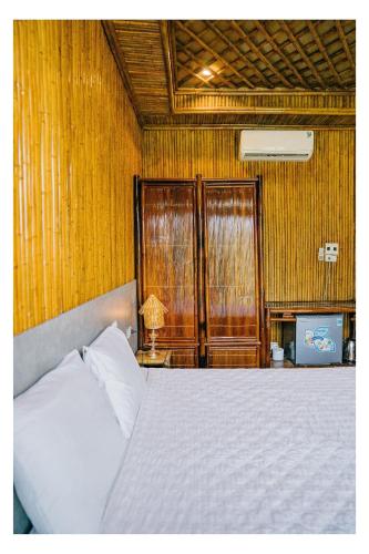 Letto o letti in una camera di Tam Coc Windy Fields